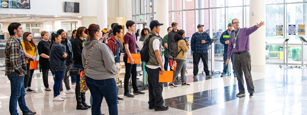 Students on a campus tour in the GWC Student Services Center lobby.